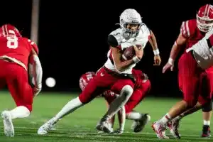 Westside High School quarterback Anthony Rezac (5) runs the ball during a game between the Millard South and Omaha Westside in Omaha, NE on Sunday October 13th, 2023. Photo by Eric Francis