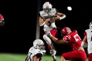 Westside High School quarterback Anthony Rezac (5) runs for a first down during a game between the Millard South and Omaha Westside in Omaha, NE on Sunday October 13th, 2023. Photo by Eric Francis