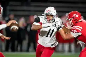 Westside High School defensive lineman Rj Eckhardt (11) rushes the passerduring a game between the Millard South and Omaha Westside in Omaha, NE on Sunday October 13th, 2023. Photo by Eric Francis