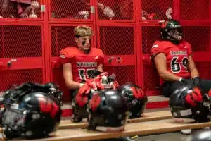 Westside High School Finn Christensen (15) and Westside Higih School Joe Soria (69) before a game between Lincoln North East and Westside in Omaha, NE on Thursday October 19tth, 2023. Photo by Eric Francis