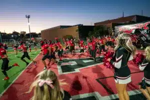 Westside High School warriors take the field before a game between Lincoln North East and Westside in Omaha, NE on Thursday October 19tth, 2023. Photo by Eric Francis