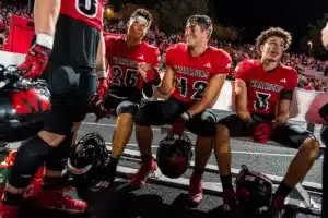 Westside High School Teddy Rezac (25) and Westside Higih School Beau Ryan (42) chat on the sidelines during a game between Lincoln North East and Westside in Omaha, NE on Thursday October 19tth, 2023. Photo by Eric Francis