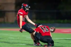 Westside High School Brody Goc (23) kicks an extra point during a game between Lincoln North East and Westside in Omaha, NE on Thursday October 19tth, 2023. Photo by Eric Francis