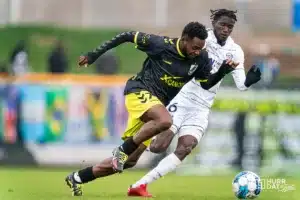 Union forward Lagos Kunga moves the ball up fieldduring a play off game between the Charlotte and Omaha Omaha, NE on Saturday October 28th, 2023. . Photo by Eric Francis