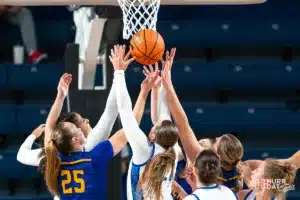 Creighton Bluejays and Nebraska Kearney Lopers fight for a rebound during a game between the Creighton Bluejays and the Nebraska Kearney Lopers in Omaha, NE on Monday October 30th, 2023. . Photo by Eric Francis