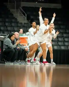 Omaha Mavericks bench cheers during a game between College of Saint Mary and the UN-Omaha in Omaha, NE on Wednesday November 8th, 2023. . Photo by Eric Francis