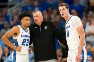 Creighton Bluejays head coach Greg McDermot talks with Creighton Bluejays guard Trey Alexander