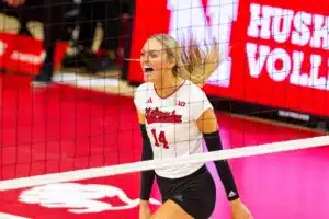 Nebraska Cornhusker Ally Batenhorst (14) celebrates a point against the Michigan Wolverines in the third set during the volleyball match on Friday, November 17, 2023, in Lincoln, Nebraska. Photo by John S. Peterson.