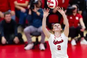 Nebraska Cornhusker Bergen Reilly (2) sets the ball against the Michigan Wolverines in the third set during the volleyball match on Friday, November 17, 2023, in Lincoln, Nebraska. Photo by John S. Peterson.