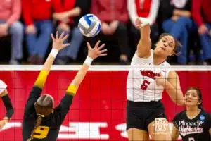 Nebraska Cornhusker Bekka Allick (5) spikes the ball against Missouri Tiger Morgan Isenberg (9) in the seocond set during the second round of the NCAA volleyball championships on Saturday, December 2, 2023, in Lincoln, Neb. Photo by John S. Peterson.