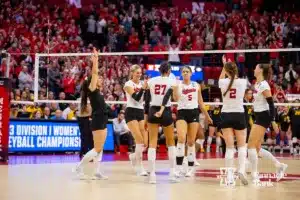 Nebraska Cornhuskers celebrate the win over the Missouri Tigers in three sets during the second round of the NCAA volleyball championships on Saturday, December 2, 2023, in Lincoln, Neb. Photo by John S. Peterson.