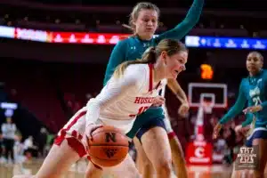 Nebraska Cornhusker guard Kendall Moriarty (15) drives the baseline against UNC Wilmington Seahawks in the second half during a college basketball game Tuesday, December 5, 2023, in Lincoln, Neb. Photo by John S. Peterson.