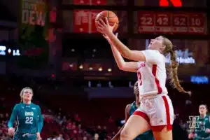 Nebraska Cornhusker guard Logan Nissley (2) makes lay up from a fast break against the UNC Wilmington Seahawks in the first half during a college basketball game Tuesday, December 5, 2023, in Lincoln, Neb. Photo by John S. Peterson.