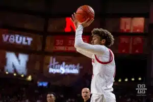 Nebraska Cornhusker guard Eli Rice (11) makes a three point shot from the corner against the Michigan State Spartans in the first half during the college basketball game Sunday, December 10, 2023, Lincoln, Neb. Photo by John S. Peterson.