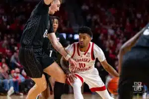 Nebraska Cornhusker guard Jamarques Lawrence (10) drive to the lane against Michigan State Spartan center Carson Cooper (15) in the first half during the college basketball game Sunday, December 10, 2023, Lincoln, Neb. Photo by John S. Peterson.