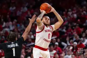 Nebraska Cornhusker guard C.J. Wilcher (0) makes a three against Michigan State Spartan guard Jeremy Fears Jr. (1) in the second half during the college basketball game Sunday, December 10, 2023, Lincoln, Neb. Photo by John S. Peterson.