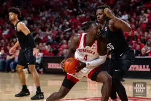 Nebraska Cornhusker forward Juwan Gary (4) drive to the lane against Michigan State Spartan forward Coen Carr (55) in the second half during the college basketball game Sunday, December 10, 2023, Lincoln, Neb. Photo by John S. Peterson.