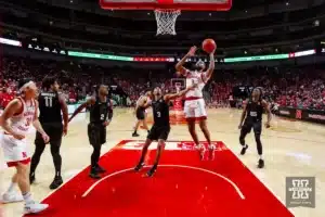 Nebraska Cornhusker guard Brice Williams (3) makes a layup against Michigan State Spartan guard Jaden Akins (3) in the second half during the college basketball game Sunday, December 10, 2023, Lincoln, Neb. Photo by John S. Peterson.