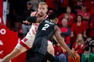 Nebraska Cornhusker forward Rienk Mast (51) defends against Michigan State Spartan guard Tyson Walker (2) in the first half during the college basketball game Sunday, December 10, 2023, Lincoln, Neb. Photo by John S. Peterson.