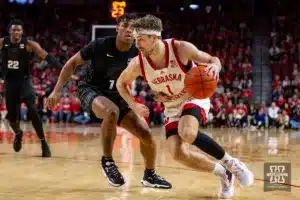 Nebraska Cornhusker guard Sam Hoiberg (1) drives to the basket against Michigan State Spartan guard Jeremy Fears Jr. (1) in the first half during the college basketball game Sunday, December 10, 2023, Lincoln, Neb. Photo by John S. Peterson.