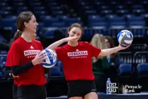 Nebraska Cornhusker Bergen Reilly (2),  Kennedi Orr (9), and Merritt Beason having fun during open practice before the NCAA Semi-Finals, Wednesday, December 13, 2023, Tampa, Florida. Photo by John S. Peterson.