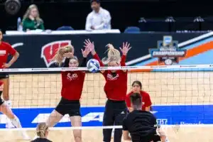 Nebraska Cornhusker Andi Jackson (15) and Ally Batenhorst block the ball during open practice before the NCAA Semi-Finals, Wednesday, December 13, 2023, Tampa, Florida. Photo by John S. Peterson.