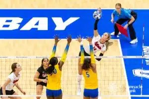 Nebraska Cornhusker outside hitter Ally Batenhorst (14) spikes the ball against the Pittsburgh Panthers in the second set during the NCAA Semi-Finals, Thursday, December 14, 2023, Tampa, Florida. Photo by John S. Peterson.