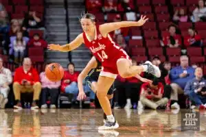 Nebraska Cornhusker guard Callin Hake (14) steals the ball against the Michigan Wolverines in the second half during a college basketball game on Wednesday, January 17, 2024, in Lincoln, Nebraska. Photo by John S. Peterson.