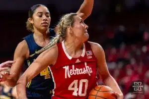 Nebraska Cornhusker center Alexis Markowski (40) makes a lay up against Michigan Wolverine forward Cameron Williams (44) in the second half during a college basketball game on Wednesday, January 17, 2024, in Lincoln, Nebraska. Photo by John S. Peterson.