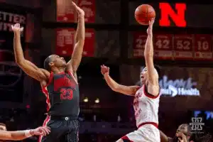 Nebraska Cornhusker guard Keisei Tominaga (30) makes a lay up against Ohio State Buckeye forward Zed Key (23) in the first half during a college basketball game on Tuesday, January 23, 2024, in Lincoln, Nebraska. Photo by John S. Peterson.