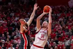 Nebraska Cornhusker forward Rienk Mast (51) makes a three point shot against Ohio State Buckeye forward Jamison Battle (10) in the second half during a college basketball game on Tuesday, January 23, 2024, in Lincoln, Nebraska. Photo by John S. Peterson.