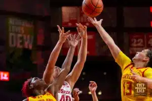 Nebraska Cornhusker center Alexis Markowski (40) battles for the rebound against Maryland Terrapin guard Bri McDaniel (24) and guard Brinae Alexander (5) in the first half during a college basketball game on Sunday, December 31, 2023, in Lincoln, Nebraska. Photo by John S. Peterson.