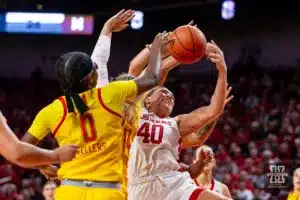 Nebraska Cornhusker center Alexis Markowski (40) battles for the rebound against Maryland Terrapin guard Shyanne Sellers (0) in the second half during a college basketball game on Sunday, December 31, 2023, in Lincoln, Nebraska. Photo by John S. Peterson.