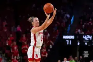 Nebraska Cornhusker guard Callin Hake (14) makes a three point shot in the fourth quarter against the Maryland Terrapins during a college basketball game on Sunday, December 31, 2023, in Lincoln, Nebraska. Photo by John S. Peterson.