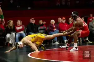 Nebraska Cornhusker Antrell Taylor pulls Wyoming Cowboy Brett McIntosh back on the mat during a college wrestling match on Saturday, January 6, 2024, in Lincoln, Nebraska. Photo by John S. Peterson.