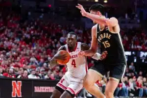 Nebraska Cornhusker forward Juwan Gary (4) drives to the basket against Purdue Boilermaker center Zach Edey (15) in the first half during a college basketball game on January 9, 2024, in Lincoln, Nebraska. Photo by John S. Peterson.