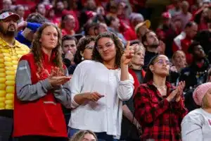 Nebraska Cornhusker volleyball player Rebbeca Alick watching her brother against the Purdue Boilermakers during a college basketball game on January 9, 2024, in Lincoln, Nebraska. Photo by John S. Peterson.