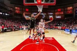 Nebraska Cornhusker guard Sam Hoiberg (1) makes a lay up against Purdue Boilermaker forward Mason Gillis (0) in the first half during a college basketball game on January 9, 2024, in Lincoln, Nebraska. Photo by John S. Peterson.