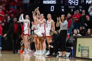 Nebraska Cornhuskers celebrate the first basket against the Purdue Boilermakers during a college basketball game on Wednesday, January 31, 2024, in Lincoln, Nebraska. Photo by John S. Peterson.