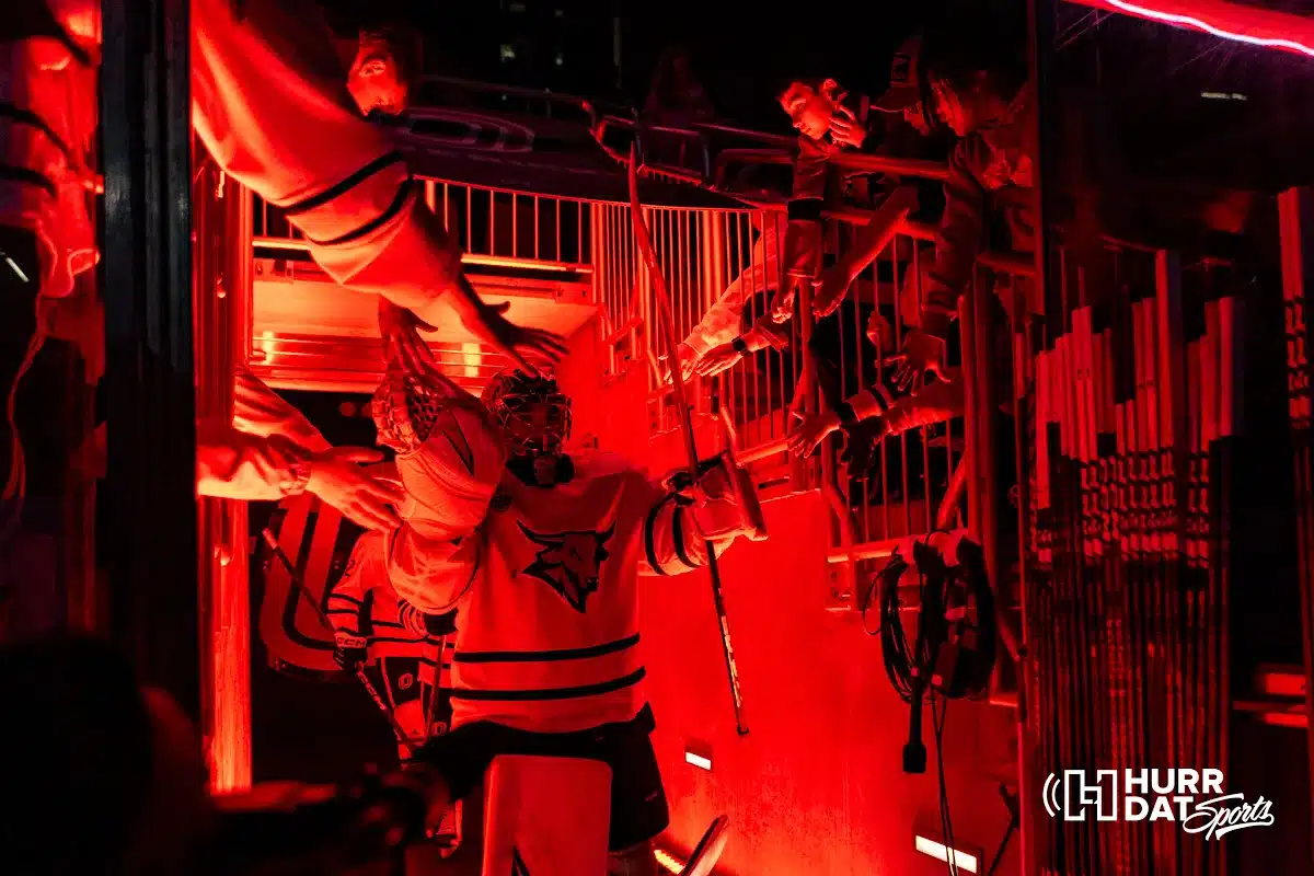 Omaha goaltender Simon Latkoczy (30) leads the Mavs out on to the ice to take on Minn. Duluth during a college hockey match on Friday, February 2, 2024, in Omaha, Nebraska. Photo by John S. Peterson.