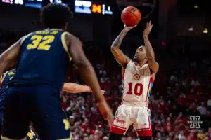 Nebraska Cornhusker guard Jamarques Lawrence (10) makes a jump shot against the Michigan Wolverines in the first half during a college basketball game on Saturday, February 10, 2024, in Lincoln, Nebraska. Photo by John S. Peterson.