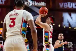 Nebraska Cornhusker guard Keisei Tominaga (30) makes a three point shot against the Michigan Wolverines in the first half during a college basketball game on Saturday, February 10, 2024, in Lincoln, Nebraska. Photo by John S. Peterson.