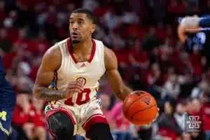 Nebraska Cornhusker guard Jamarques Lawrence (10) dribbles the ball against the Michigan Wolverines in the first half during a college basketball game on Saturday, February 10, 2024, in Lincoln, Nebraska. Photo by John S. Peterson.