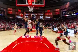 Nebraska Cornhusker guard Jamarques Lawrence (10) makes a lay up against the Michigan Wolverines in the first half during a college basketball game on Saturday, February 10, 2024, in Lincoln, Nebraska. Photo by John S. Peterson.