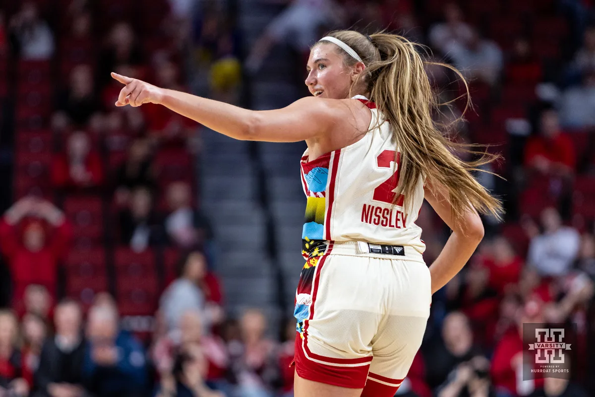 Nebraska Cornhusker guard Logan Nissley (2) gives a recognition for the assist against the Northwestern Wildcats in the second quarter during a college basketball game Tuesday, February 20, 2024, in Lincoln, Neb. Photo by John S. Peterson.