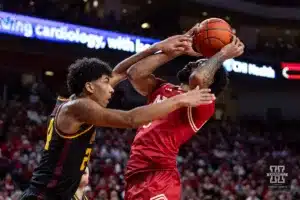 Nebraska Cornhusker guard Brice Williams (3) fouled by Minnesota Golden Gopher guard Cam Christie (24) in the first half during a college basketball game Sunday, February 25, 2024, in Lincoln, Neb. Photo by John S. Peterson.