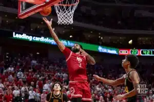 Nebraska Cornhusker guard Brice Williams (3) makes a lay up against Minnesota Golden Gopher guard Cam Christie (24) in the first half during a college basketball game Sunday, February 25, 2024, in Lincoln, Neb. Photo by John S. Peterson.