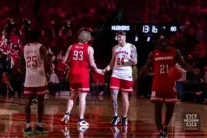 Nebraska Cornhusker footbal player Thomas Fidone (24) performs in the halftime dunk contest during a college basketball game against the Minnesota Golden Gophers Sunday, February 25, 2024, in Lincoln, Neb. Photo by John S. Peterson.