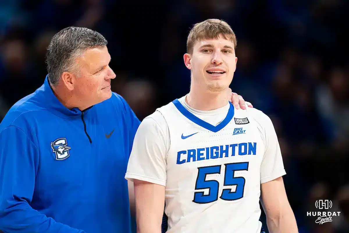 Creighton Bluejays head coach Greg McDermott talk to Creighton Bluejays guard Baylor Scheierman 