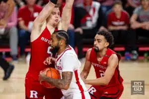 Nebraska Cornhusker guard Brice Williams (3) drives to the basket against Rutgers Scarlet Knight forward Aundre Hyatt (5) in the first half during a college basketball game Sunday, March 3, 2024, in Lincoln, Neb. Photo by John S. Peterson.